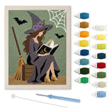Contenu du kit punch needle sorcière bohème : toile sur cadre, aiguilles et fils de laine