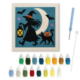 Contenu du kit punch needle sorcière et chat : toile sur cadre, aiguilles et fils de laine