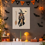 Tableau punch needle sorcière sur la lune accroché au mur dans une déco d'Halloween