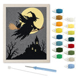 Contenu du kit punch needle sorcière manoir : toile sur cadre, aiguilles et fils de laine
