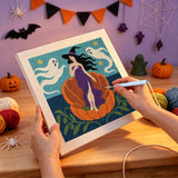Broderie punch needle en cours sur la toile de la sorcière et des fantômes