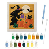 Contenu du kit punch needle sorcière jardinière : toile sur cadre, aiguilles et fils de laine