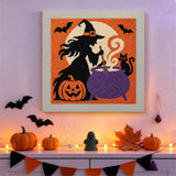 Tableau punch needle sorcière au chaudron accroché au mur dans une déco d'Halloween