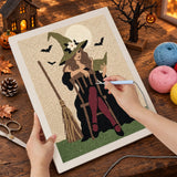 Broderie punch needle en cours sur la toile de la sorcière aux collants bordeaux, aiguille en main