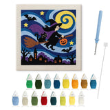 Contenu du kit punch needle sorcière : toile sur cadre, aiguilles et fils de laine