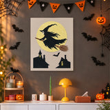 Tableau punch needle sorcière sur les toits accroché au mur dans une déco d'Halloween