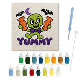 Contenu du kit punch needle squelette bonbon : toile sur cadre, aiguilles et fils de laine