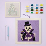 Toile imprimée numérotée à côté du tableau punch needle squelette comte terminé