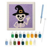 Contenu du kit punch needle Halloween squelette coucou : toile sur cadre, aiguilles et fils de laine