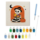 Contenu du kit punch needle Halloween squelette fleuri : toile sur cadre, aiguilles et fils de laine