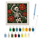 Contenu du kit punch needle danse macabre : toile sur cadre, aiguilles et fils de laine