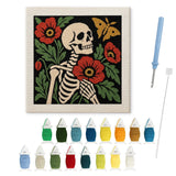 Contenu du kit punch needle squelette pavots : toile sur cadre, aiguilles et fils de laine