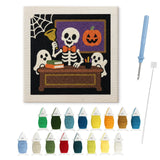 Contenu du kit punch needle squelette prof : toile sur cadre, aiguilles et fils de laine