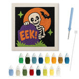 Contenu du kit punch needle squelette coucou : toile sur cadre, aiguilles et fils de laine