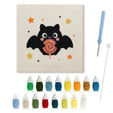 Contenu du kit punch needle Halloween chauve-souris : toile sur cadre, aiguilles et fils de laine