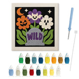 Contenu du kit punch needle tombe fleurie : toile sur cadre, aiguilles et fils de laine