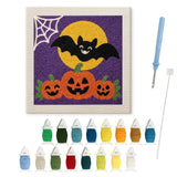 Contenu du kit punch needle trio de citrouilles : toile sur cadre, aiguilles et fils de laine