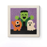 Punch Needle Halloween Trio de Monstres : tableau brodé terminé sur son cadre