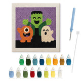 Contenu du kit punch needle trio de monstres : toile sur cadre, aiguilles et fils de laine
