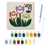 Contenu du kit punch needle tulipes fantômes : toile sur cadre, aiguilles et fils de laine