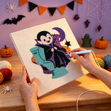 Aiguille en main, broderie punch needle en cours sur la toile du vampire à cape