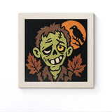 Punch Needle Halloween Zombie Corbeau : tableau brodé terminé sur son cadre
